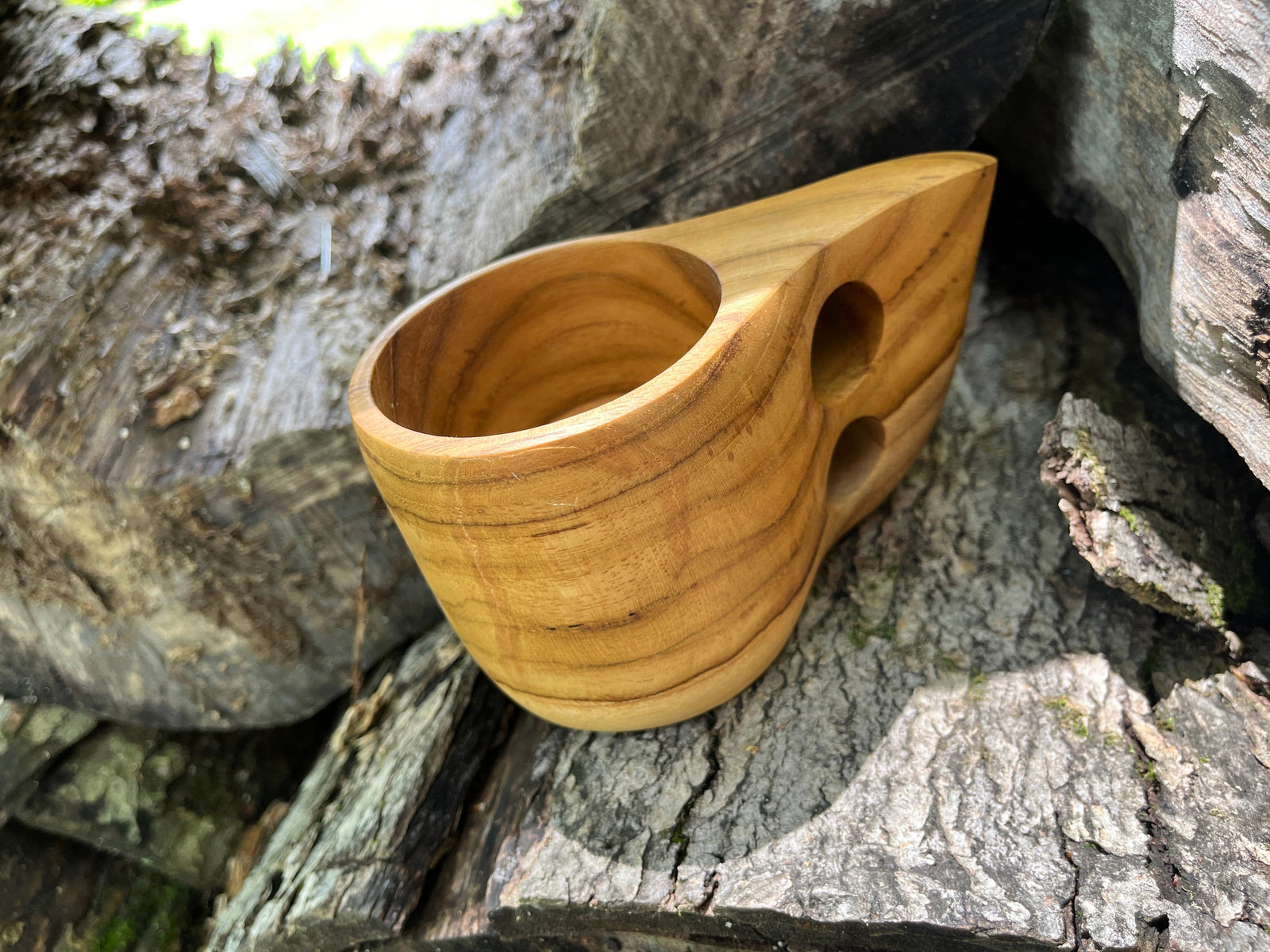 side view of teak coffee and tea mug