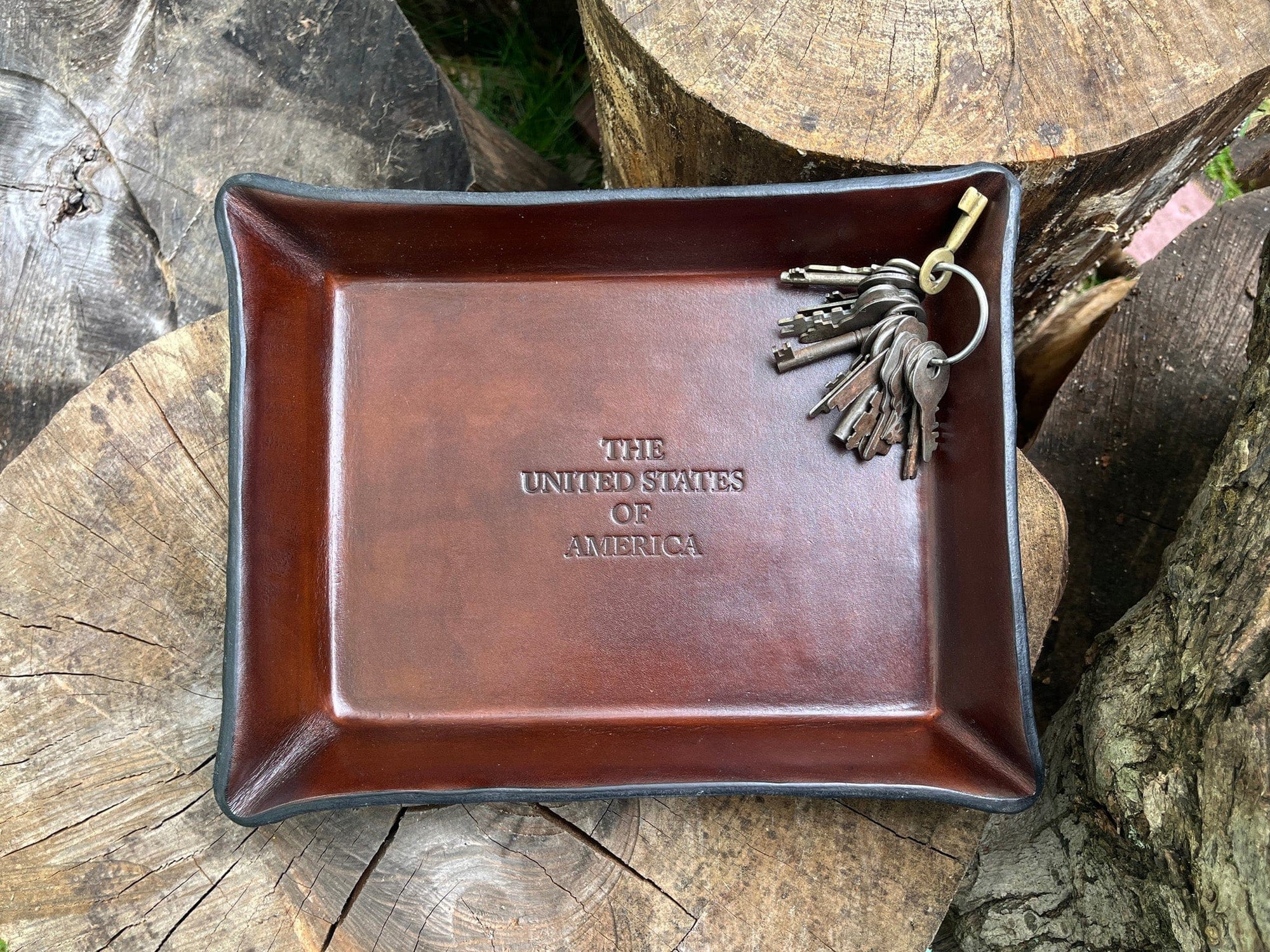 Brown valet tray embossed with The United States of America