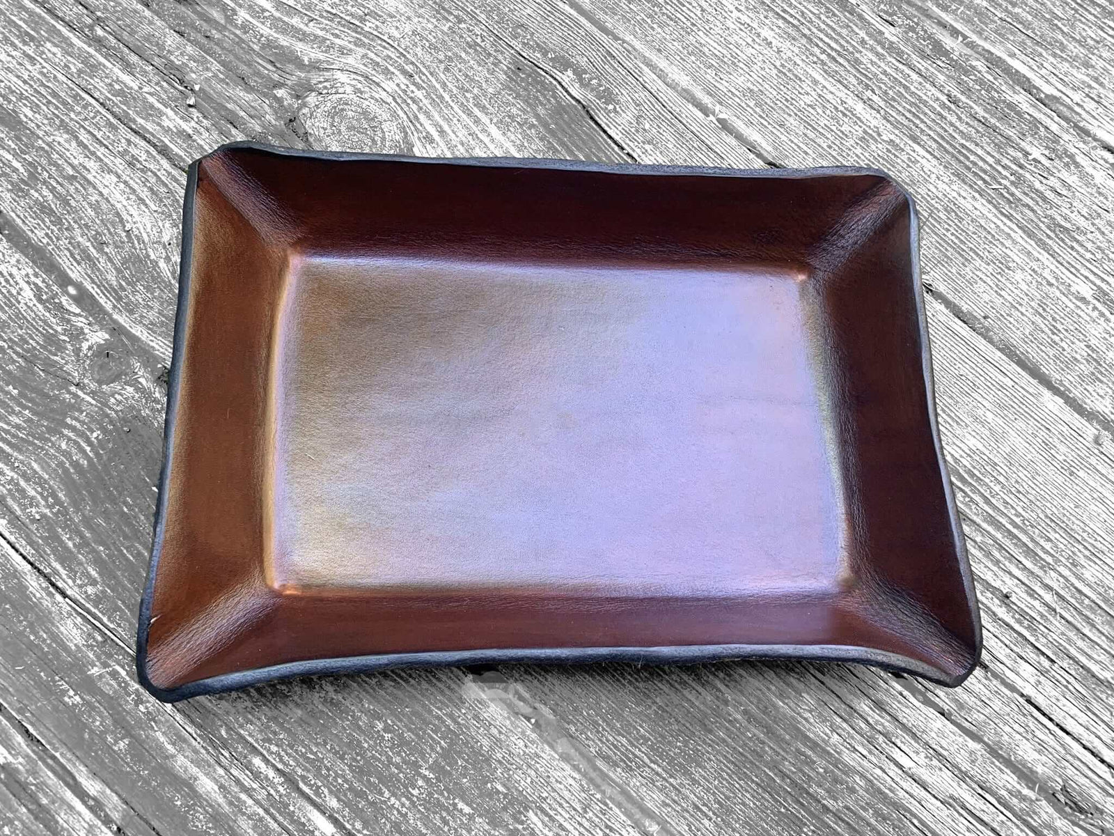 Plain dark brown leather tray. Rectangular.