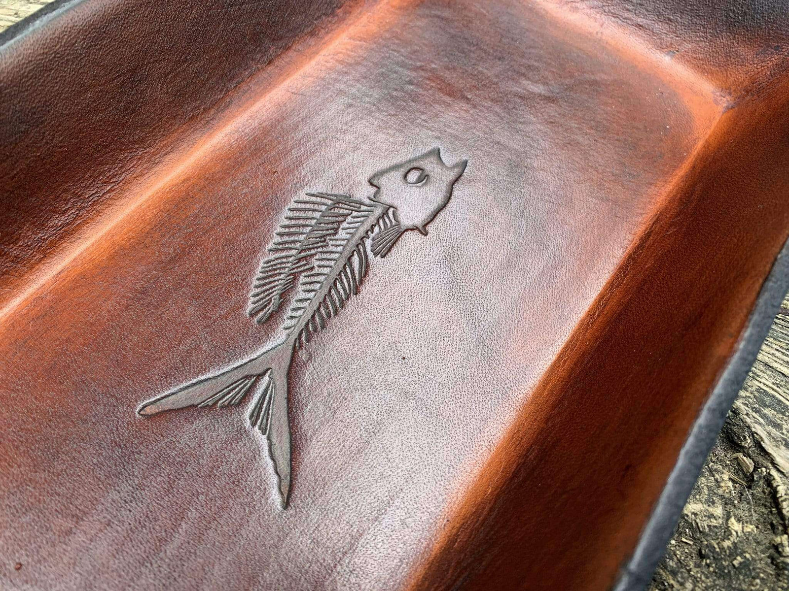 leather dresser organizer. Embossed fossil fish. Interior detail.