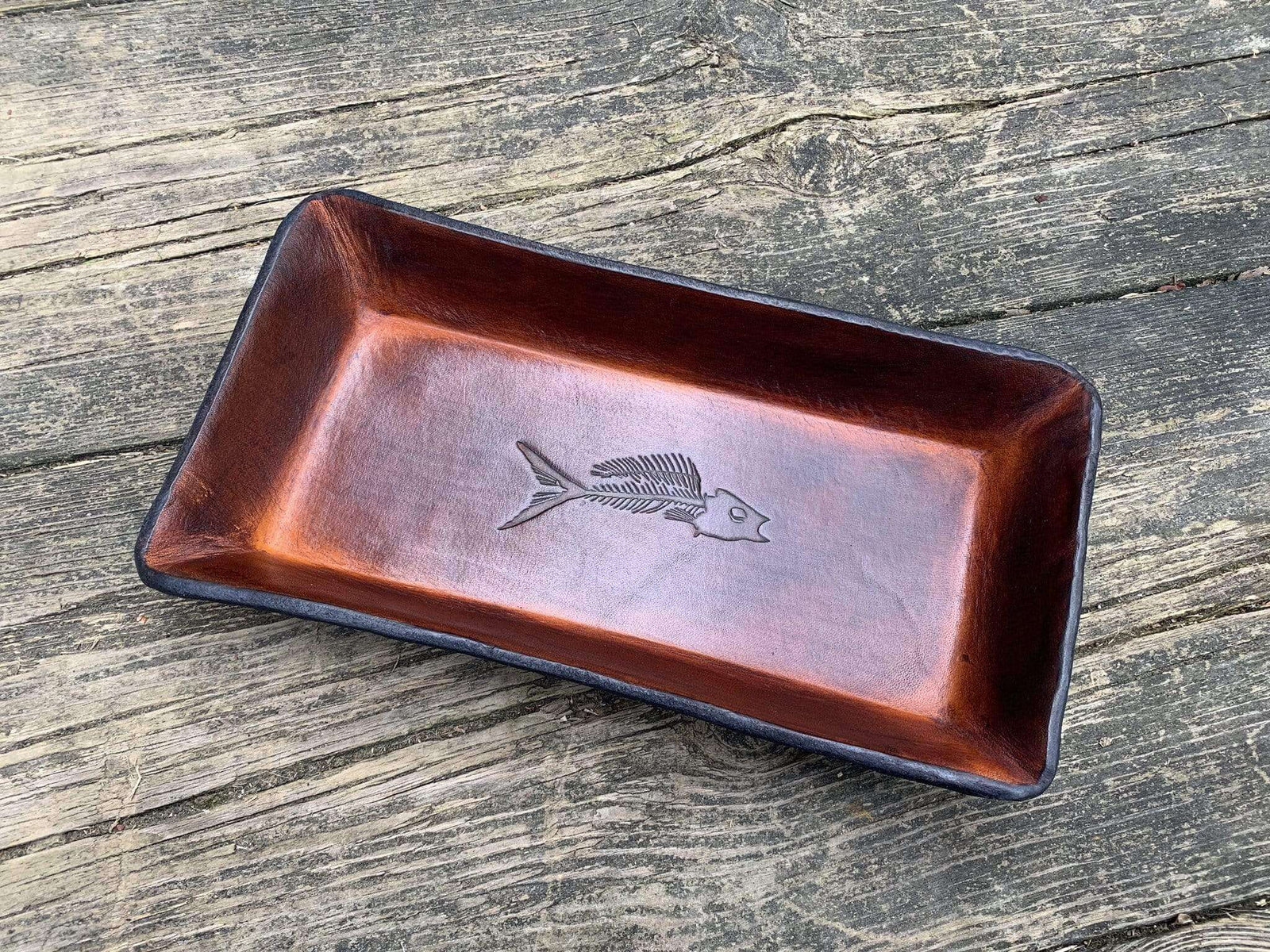 Embossed leather desk valet. fish fossil. Timber brown color.