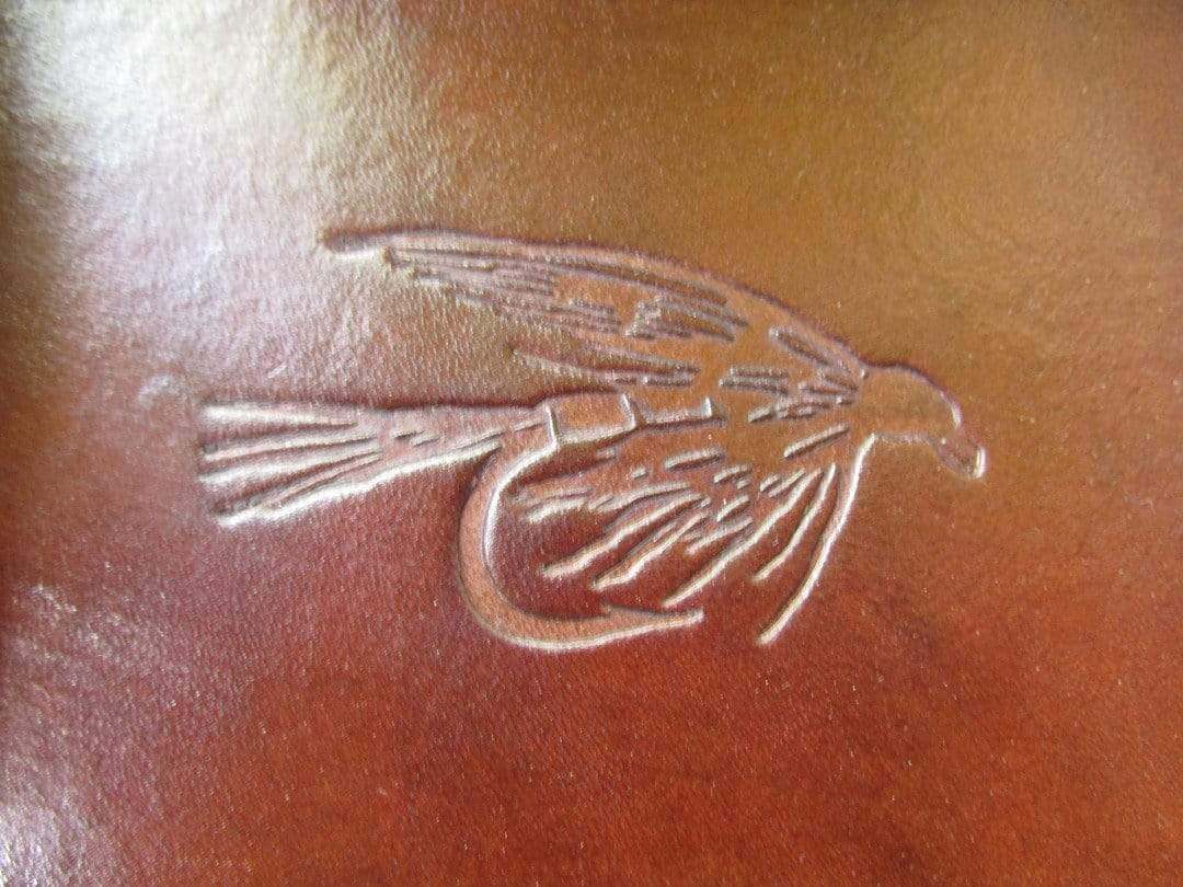 Fly fishing leather tray. Detail.