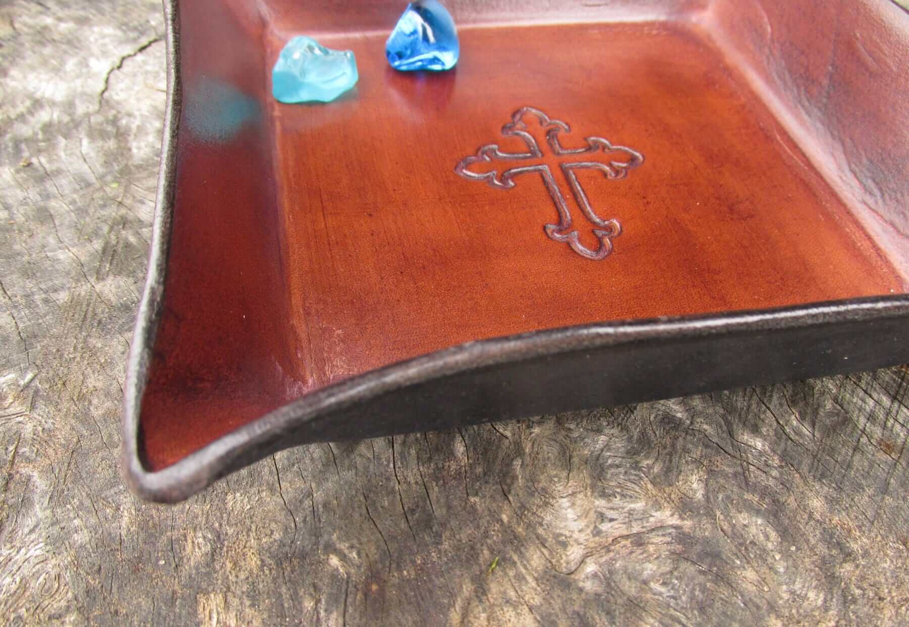Christian gift. Leather tray will cross detail. Side view. 