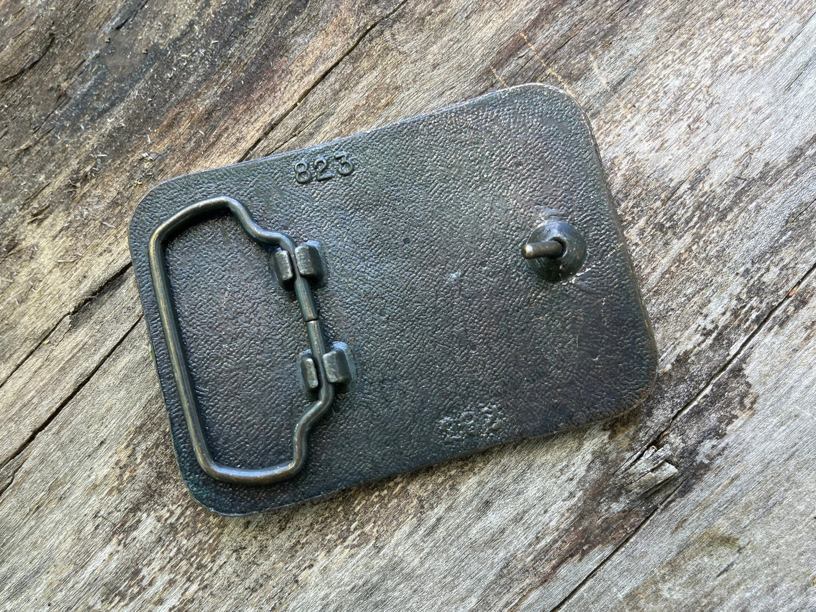 1970's Cobra CB radio belt buckle. Underside detail.