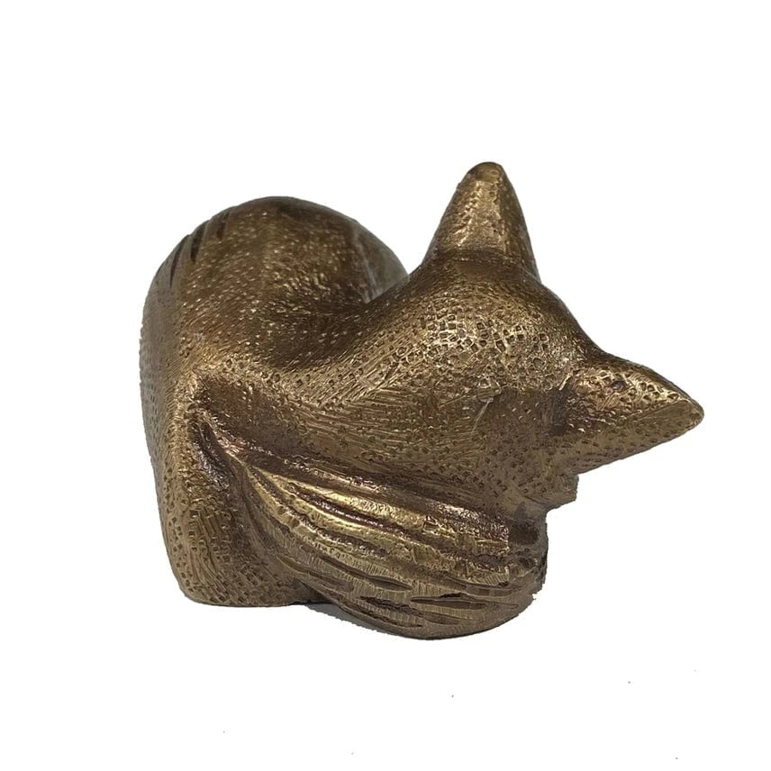 Back view detail of antiqued sleeping fox paperweight
