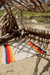 Sundream recycled throw with Tan Base, Yellow, Orange, Red, Navy.  Shown unfolded. 