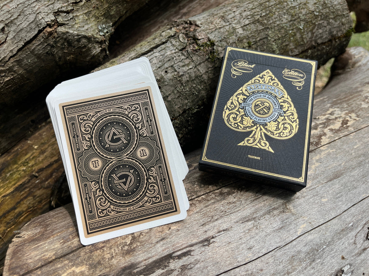 Black artisan playing cards deck and box