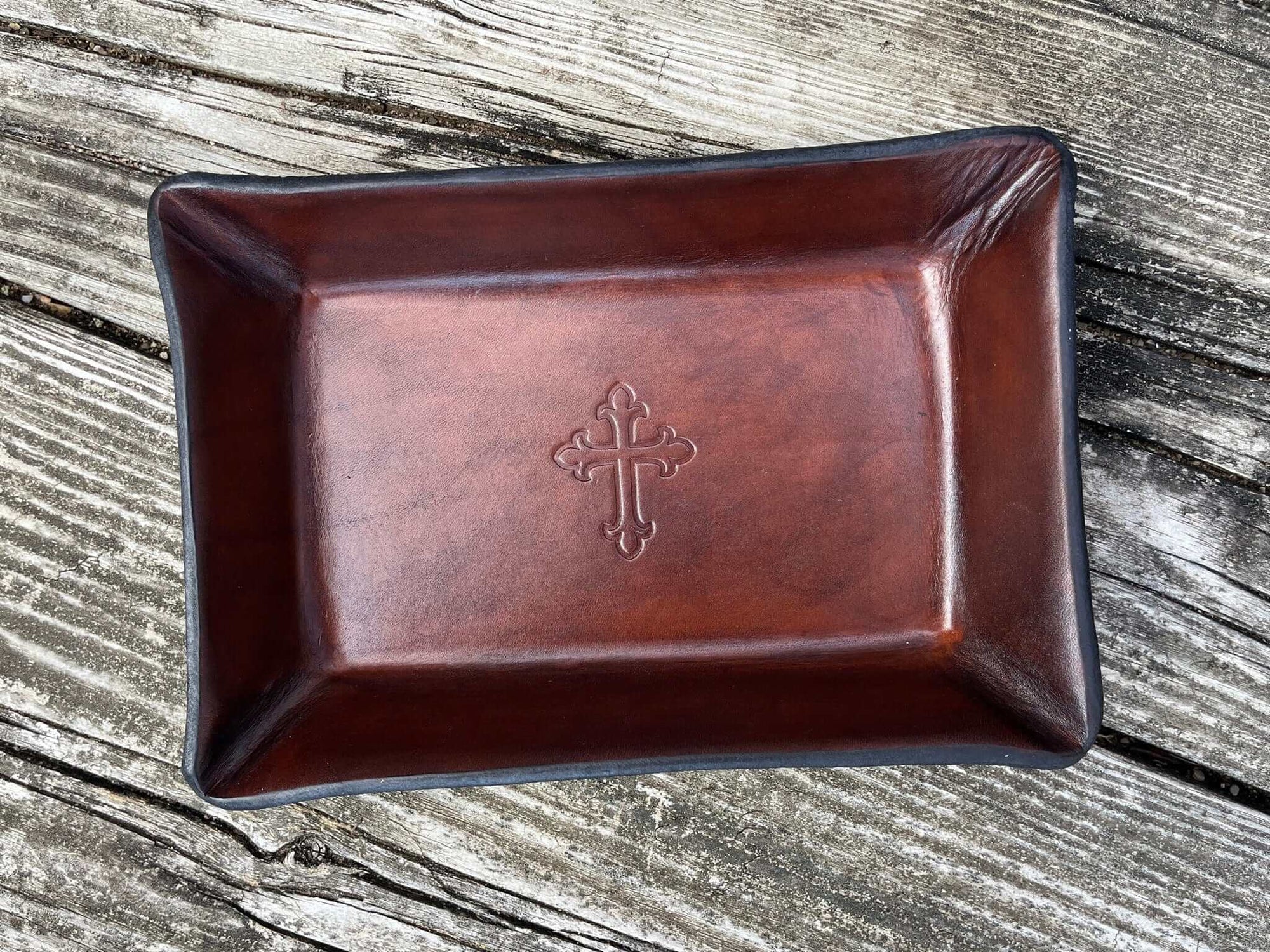 Leather tray with embossed Christian cross motif. Rectangular