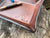 Detail of cupids arrow leather valet tray with optional monogram