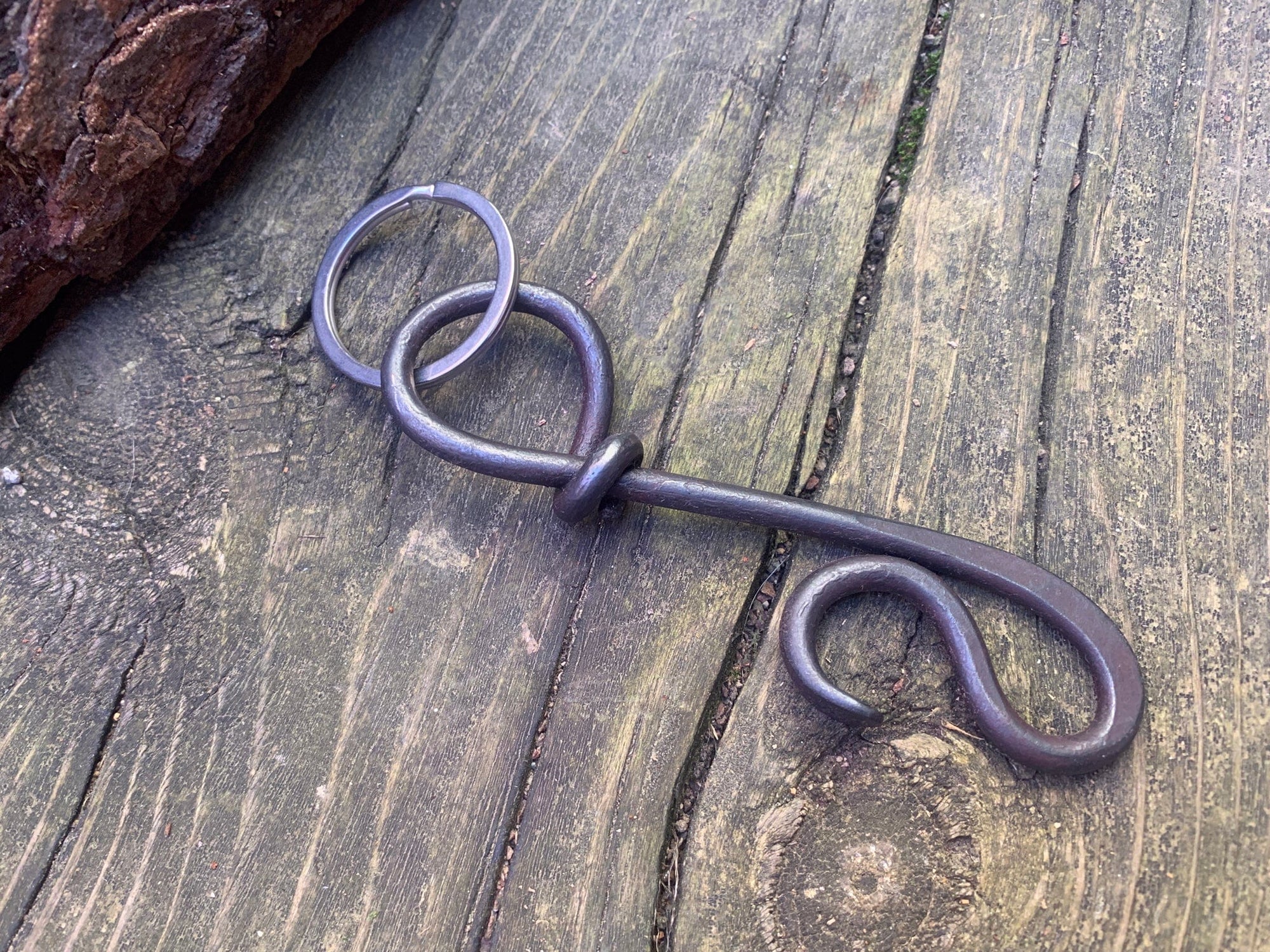 forged bottle opener keychain. 