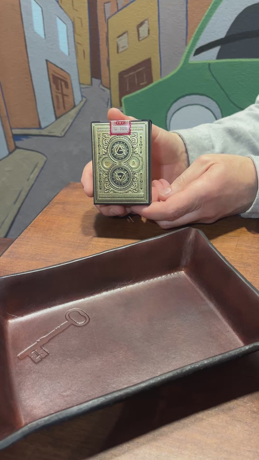 Video showing black artisan playing cards deck and individual cards