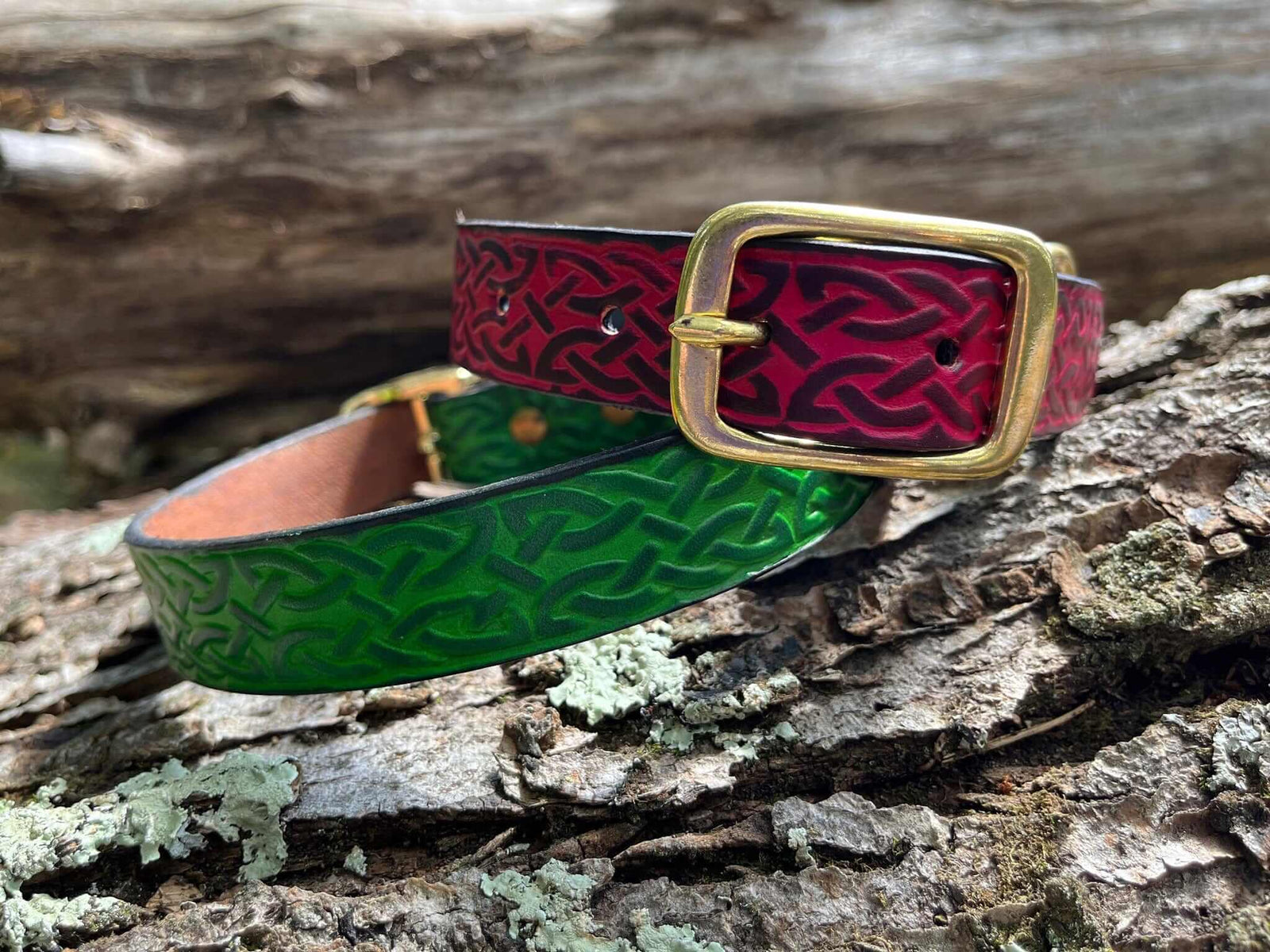 Green and red Celtic leather dog collars. 