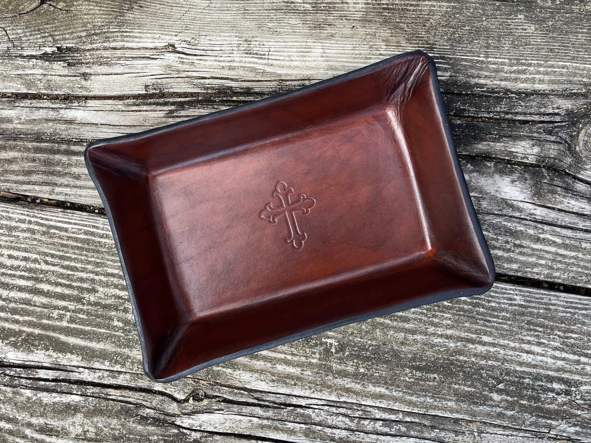 Religious leather valet tray with cross motif. Rectangular