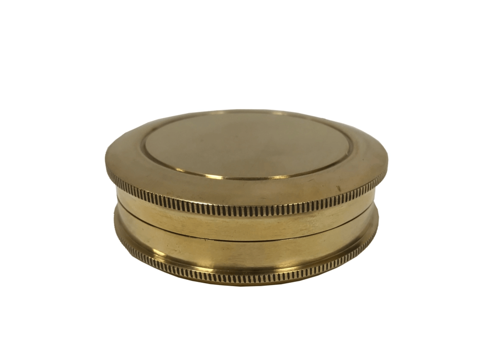 closed view of solid brass pocket compass with screw-on lid.
