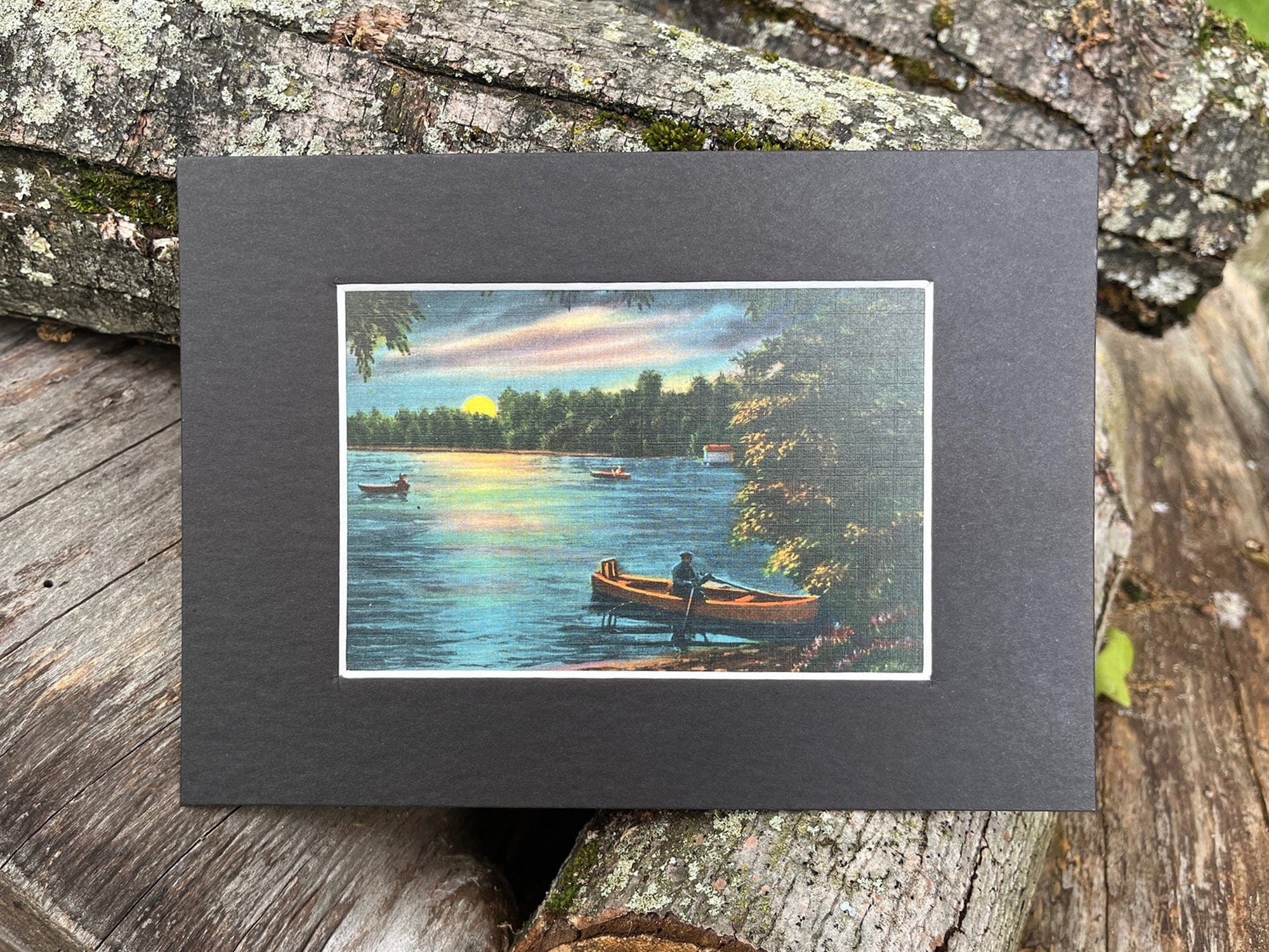 Vintage 1920's postcard of canoes at night with mat