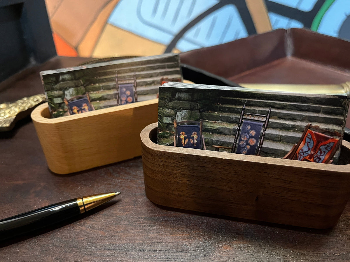 Walnut and beech wood card holders on a desk