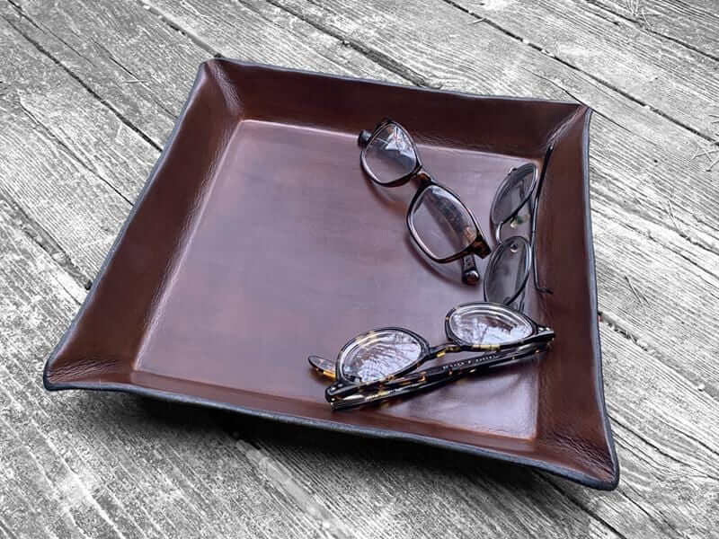 Dark brown large, square leather valet.