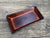 Fossil fish embossed leather valet tray. 