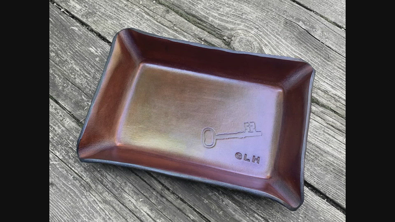 Objects shown in valet tray. Demo.