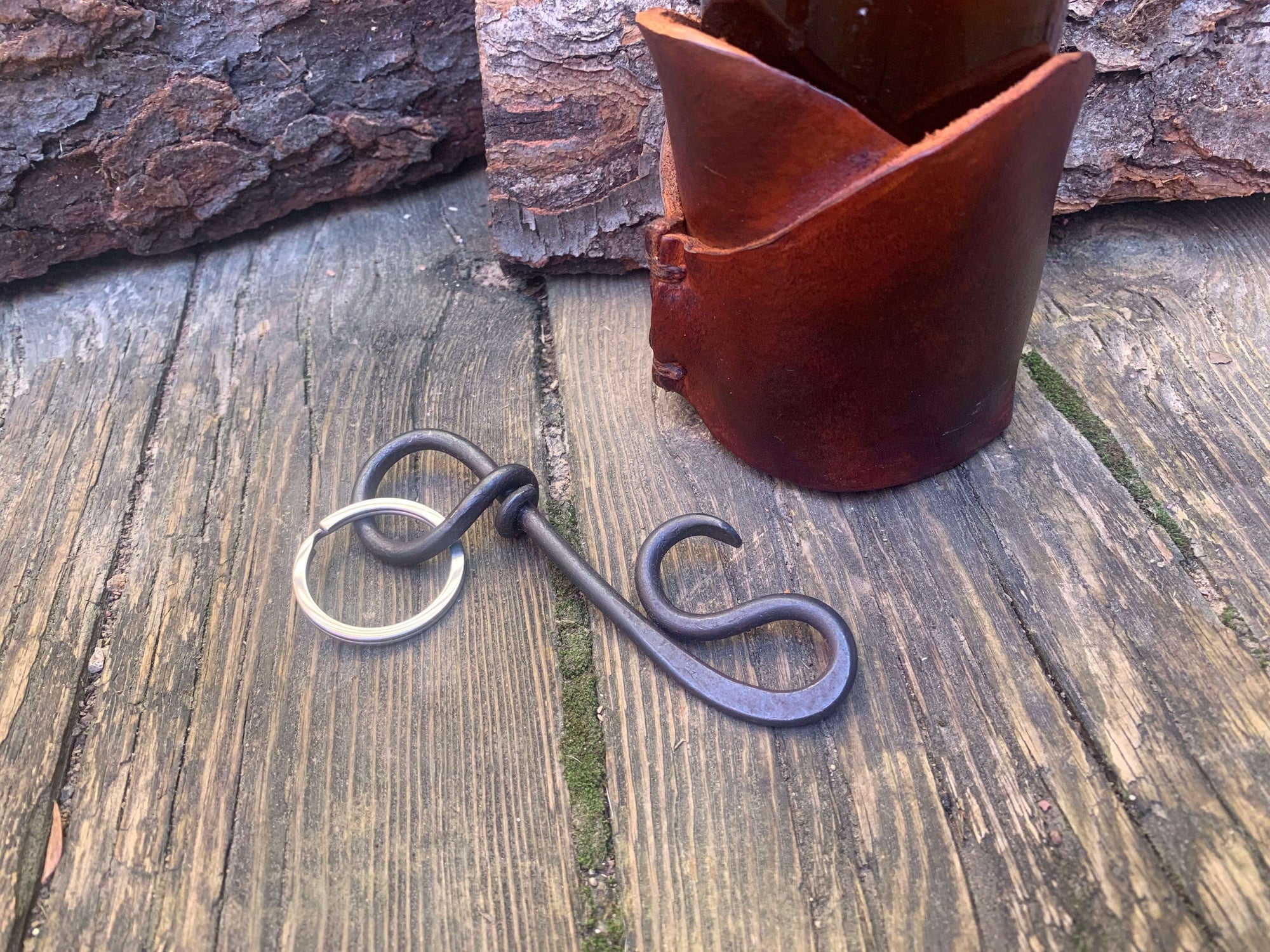 Handcrafted steel bottle opener with keychain