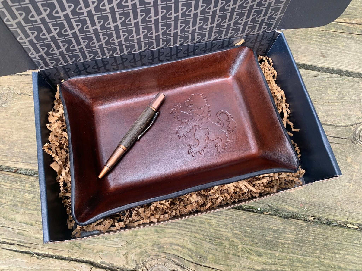 Rampant lion leather valet and bog oak pen gift set. Twin Saints