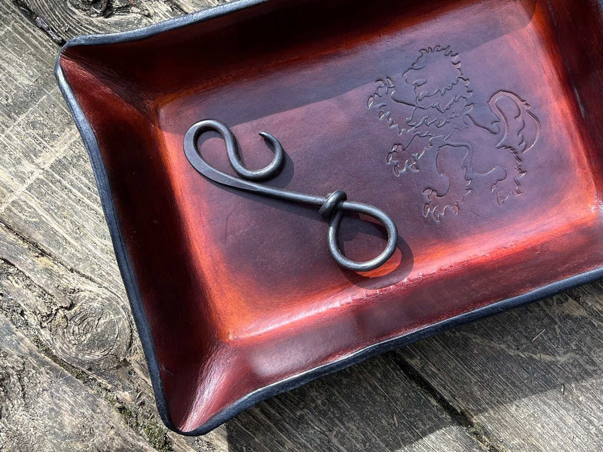 Hand forged keychain bottle opener. Detail