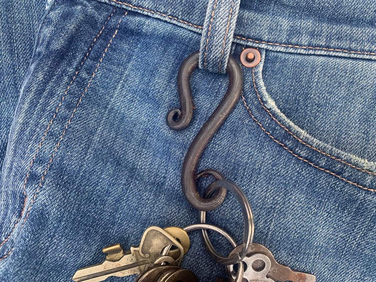 Detail of iron key ring for belt loop. Twin Saints Leather