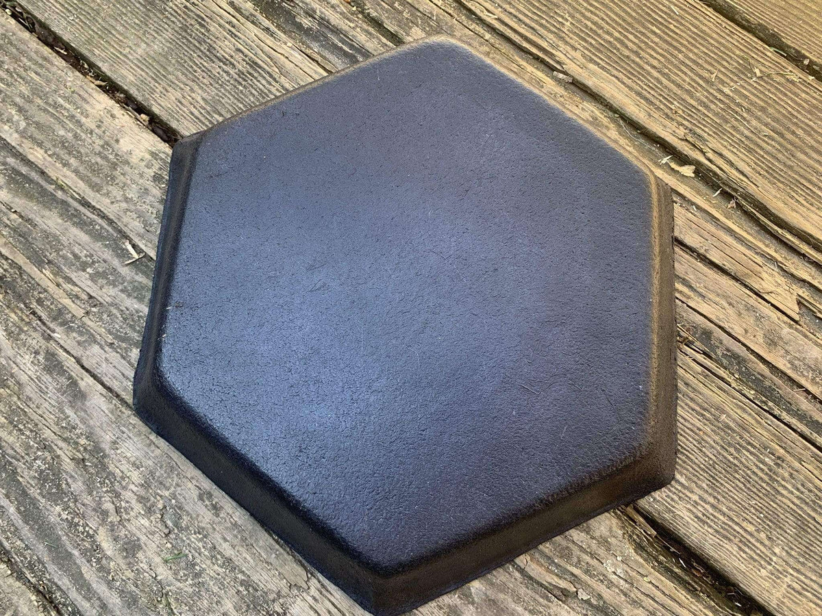 Underside of hexagonal leather dice tray. 