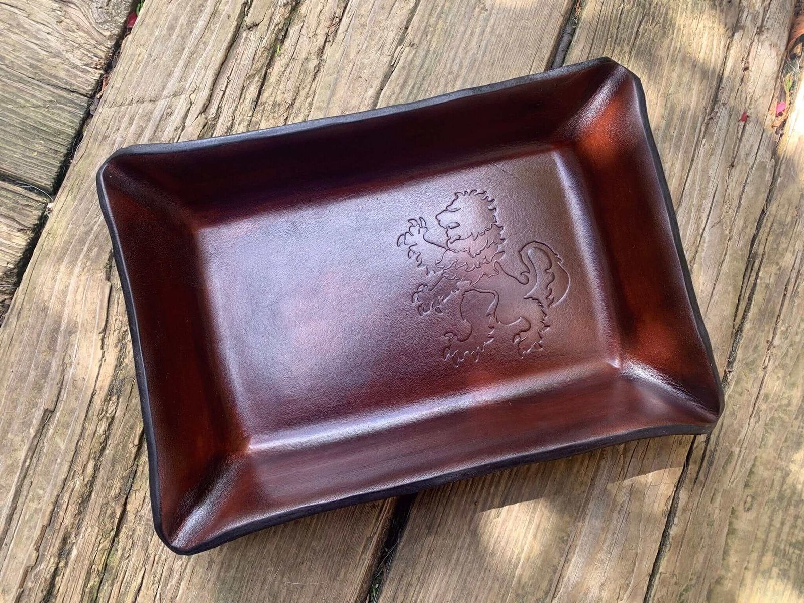 Rampant lion leather valet tray. Dark brown